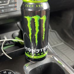 An Open, Used, and Empty Monster Energy Can