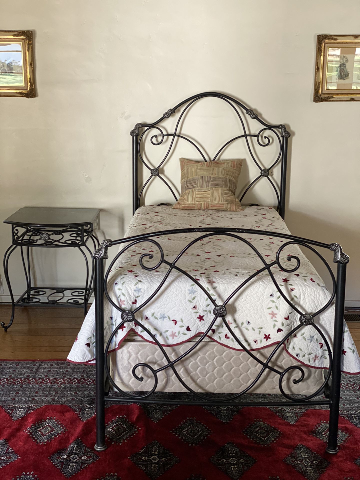 Wrought Iron Twin Bed with Black Marble Top Bedside Table