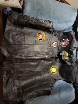 Leather biker vest. Old school. Lots of patches