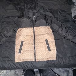  “Coach monogram puffer jacket – great condition”