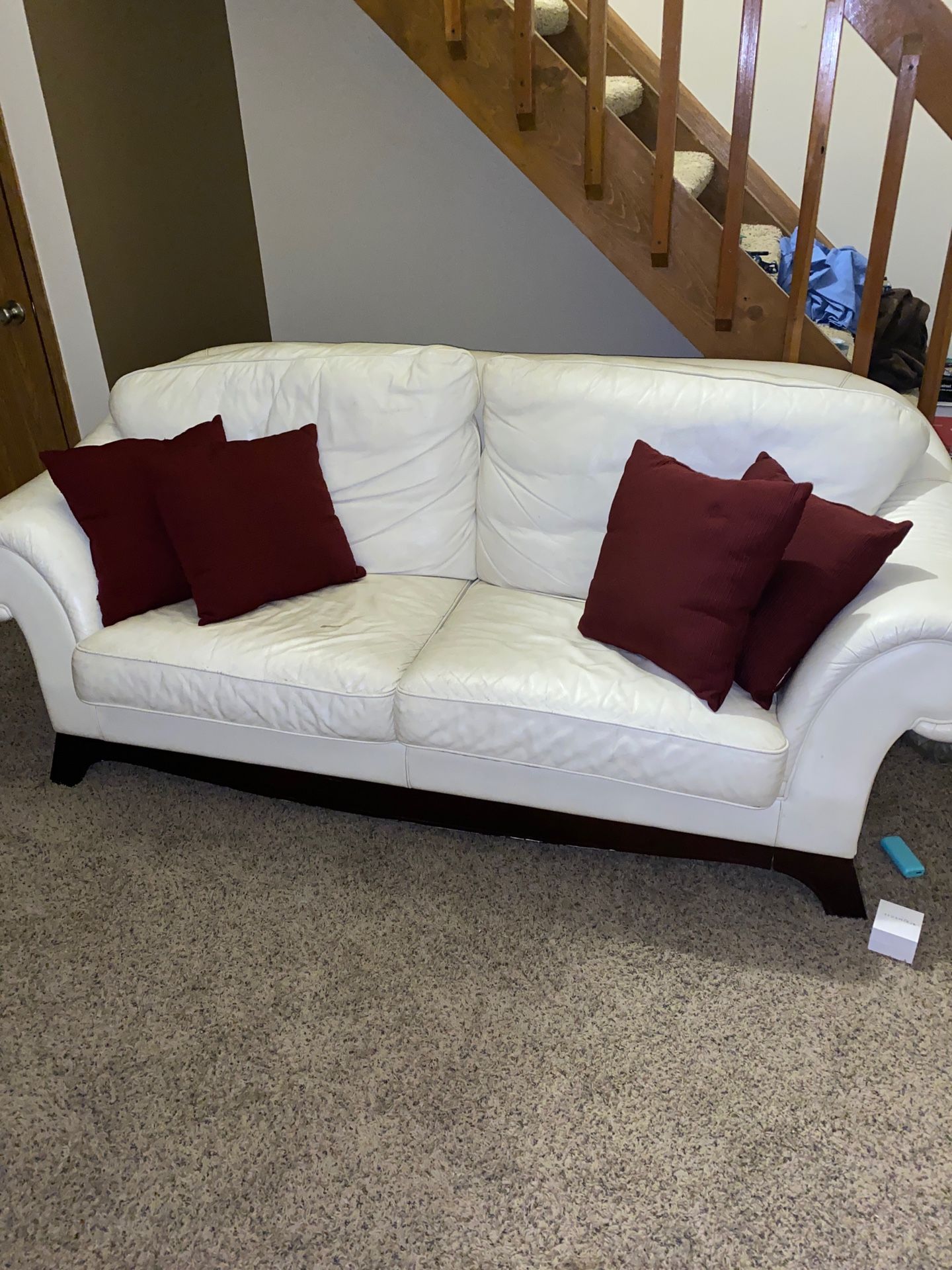 White leather couch, love seat and chair