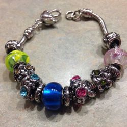 Charm bracelet similar to Pandora bracelet.  