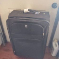 Travel piece of luggage with wheels Good shape delsey brand.