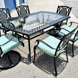 HAMPTON BAY BELCOURT PATIO DINING TABLE AND SWIVEL CHAIRS ALUMINUM