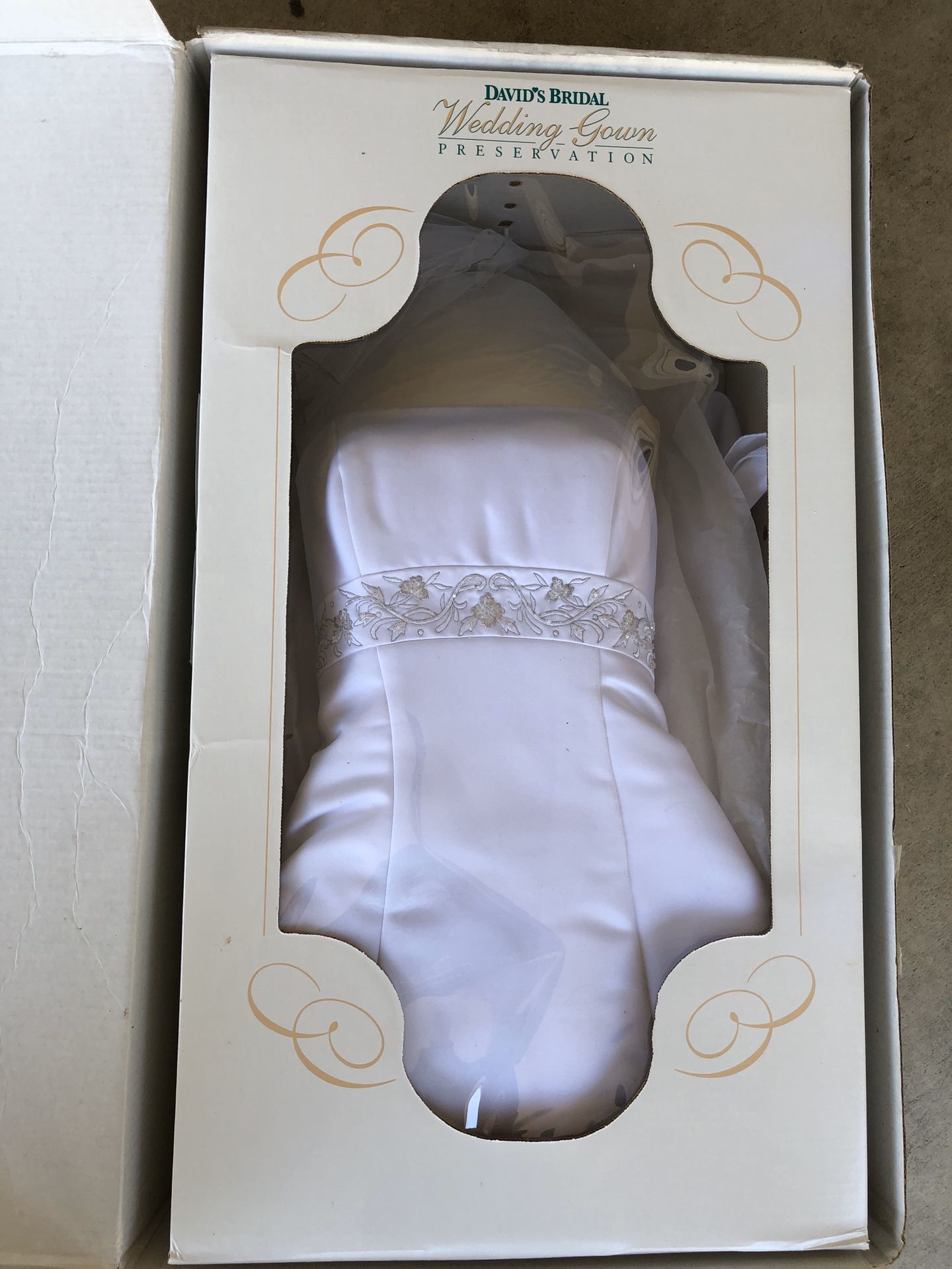 Wedding dress size 6, strapless. Preserved by David’s Bridal