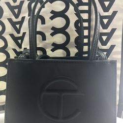 black telar mini telfar purse 