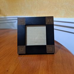 Black picture frames 5 1/2 square, picture size 3 square.