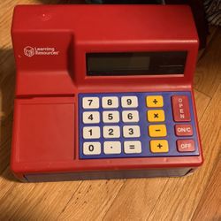 Kids play toy cash register