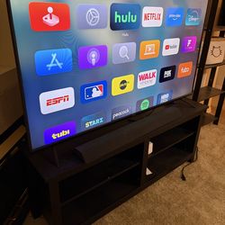 VIZIO TV with TV stand and sound bar