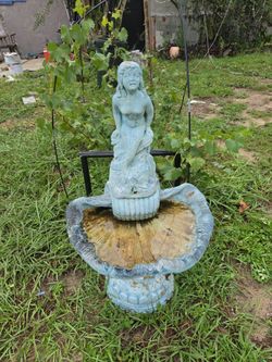 Mermaid water fountain and bell