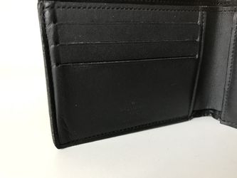 Louis Vuitton Men Multiple Wallet in embossed Damier Infini leather.