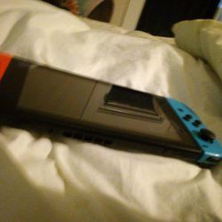 Nintendo Switch (Black, Blue And Red)