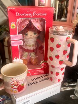 Strawberry shortcake doll and cups