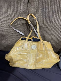 Yellow coach purse