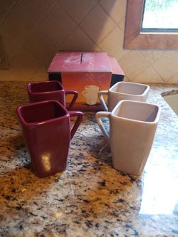 Mug Set. Unique Shape. 2 Beige & 2 Plum Color. Never Used. Come In a Box for all 4. 