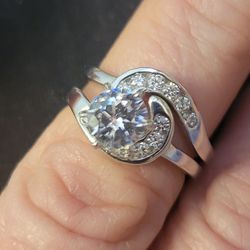 Beautiful Solid 925 Sterling Silver With Rodium Plating And 2 Ct. AAA Cubic Zirconia And Cubic Zirconians On Each Side. Size 5.