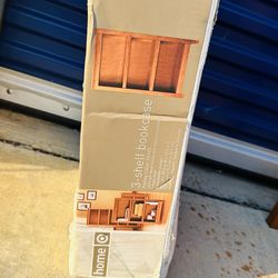 3- shelf bookcase honey color finish solid ash wood frame and melamine panels 1 fixed shelf 2 adjustable shelves 48 in H x 281/4 in W x 131/2 in D (12