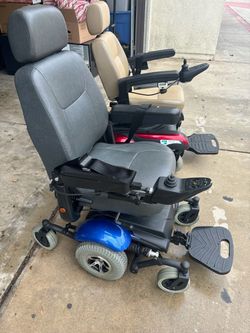 2 power wheelchairs