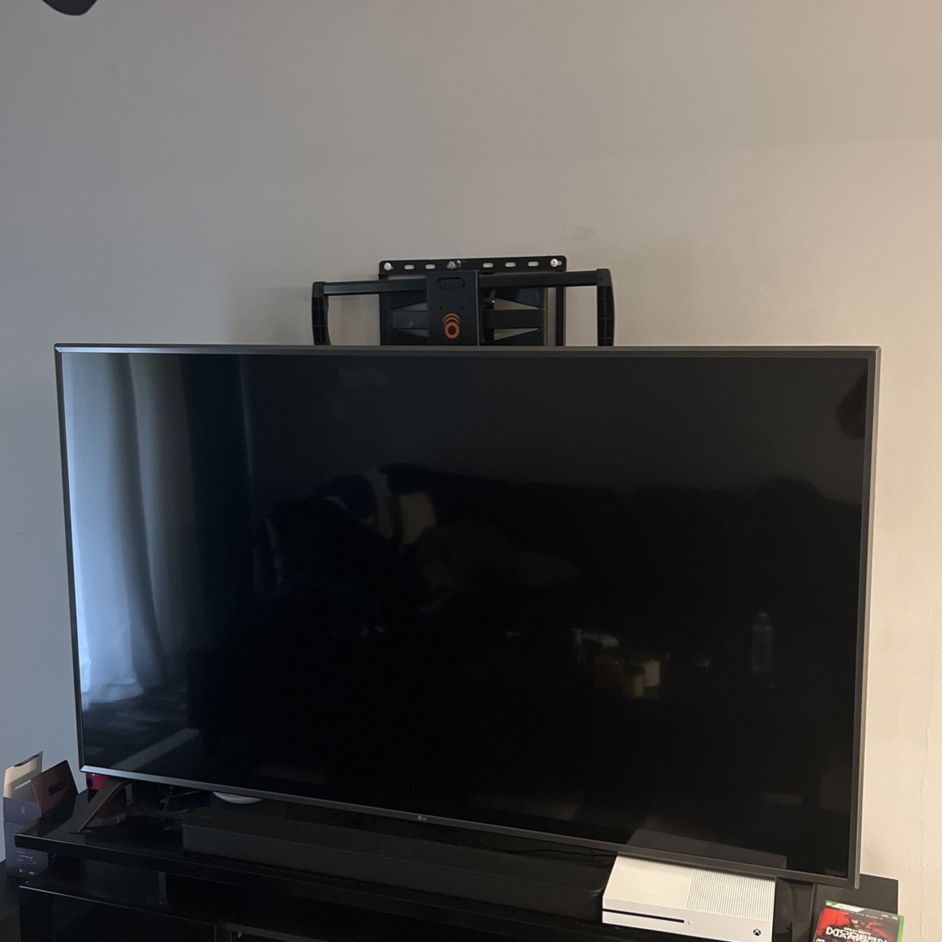 LG 75 Inch 4K TV W/ Sound bar and Subwoofer