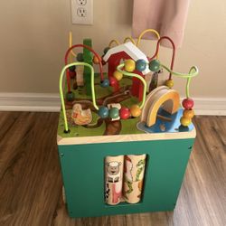 Wooden activity cube with farm theme
