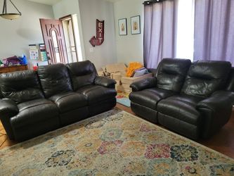 Power reclining sofa and loveseat