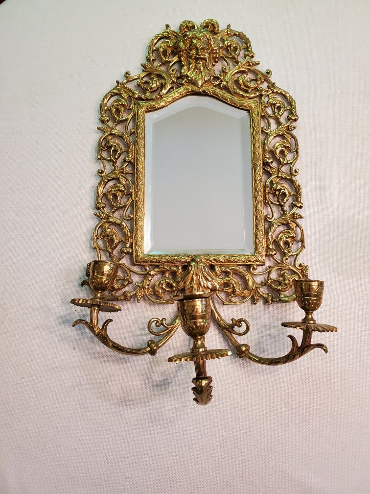 Antique brass mirror with 3 candle holders. Baltimore area