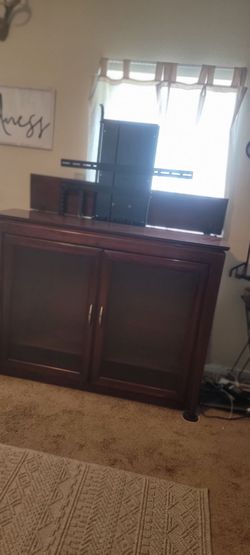 Entertainment center and tv lift