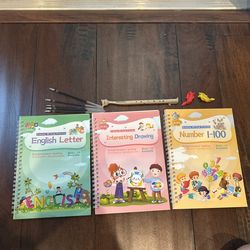 Set of Writing practice books + pen and grips