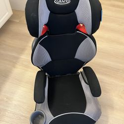 Graco booster seat with cup holder.