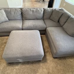 MOVING SALE - Grey Couch + Ottoman