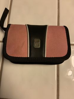 Case holder for Nintendo DS and games.