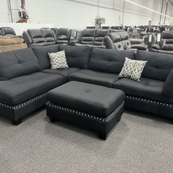 New Reversible Nailhead Sectional .  Black .  104” X 75”.  Free Delivery !