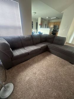 Charcoal grey sectional couch