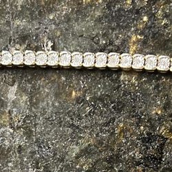 Mesmerizing Diamond/ Yellow Gold Tennis Bracelet 