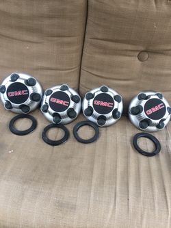 Gmc stock rims with caps good condition