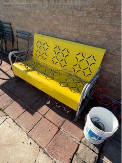 Yellow metal bench