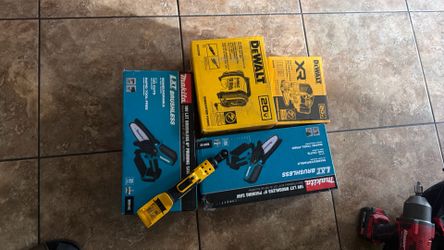Jig saw . Cordless inflator. Makita chain saw . Cordless ratchet
