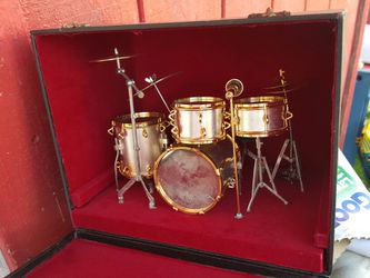Model Minature drum set in a box.