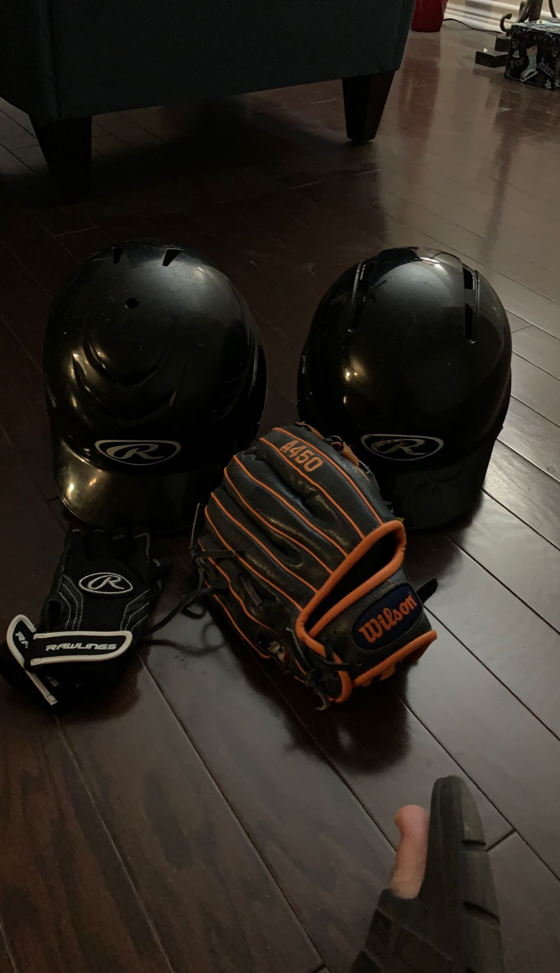 2 Rawlings helmets. 1 Wilson Left Hand glove A 450 in good condition