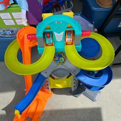 Fischer price race track with Cars