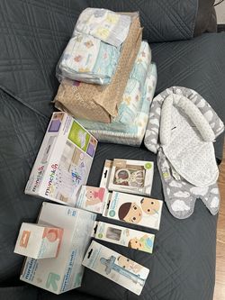 Newborn diapers and variable baby kit , relief tape for mom and nursing pads