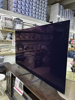 Large Flat Screen TV with Stand