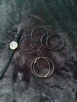 Silver rhinestone cross watch and hoop earrings , bracelets