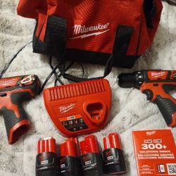 12v Milwaukee Drill And Impact With 4 Batteries 