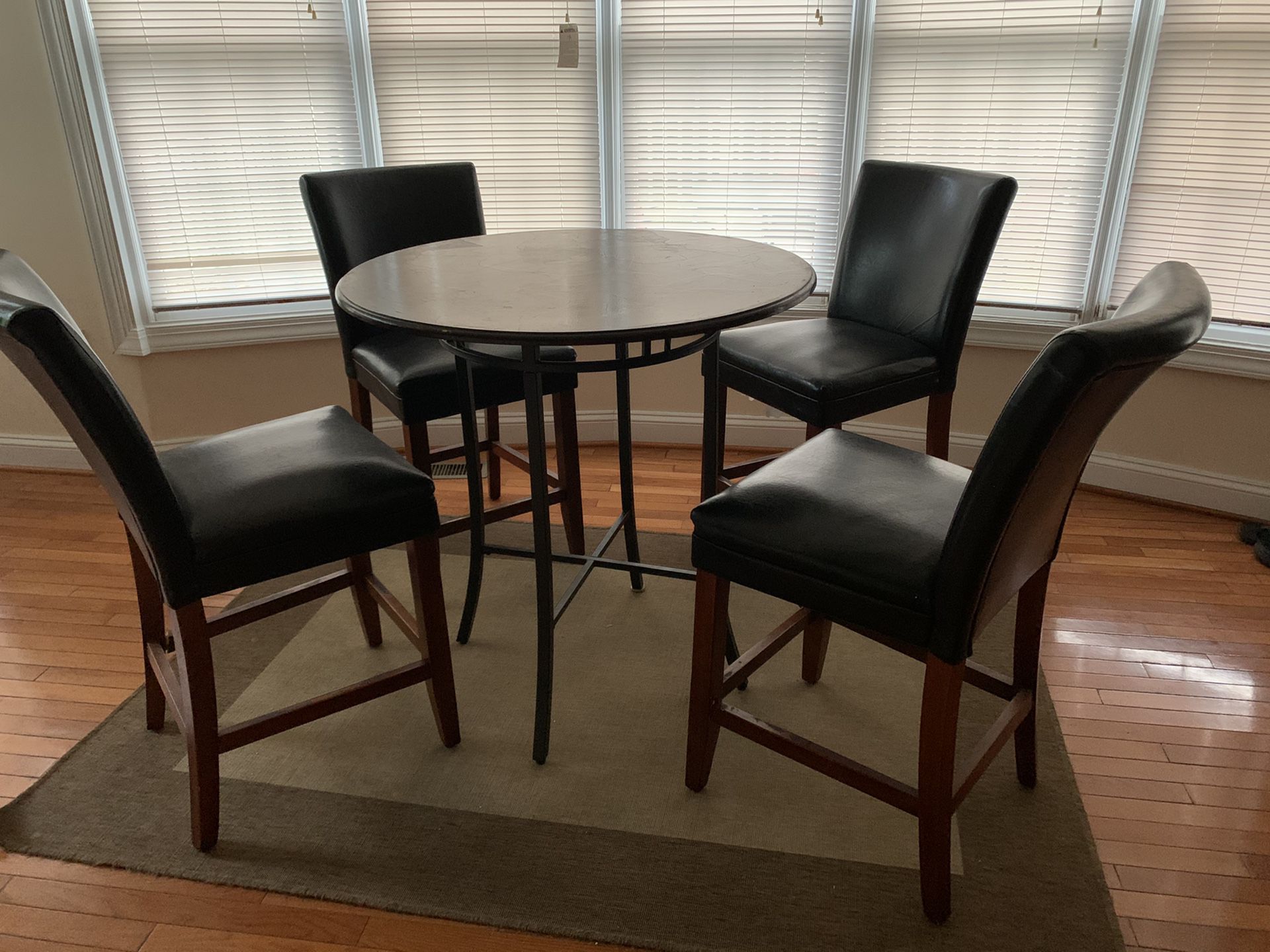 Bistro table with 4 bar chairs