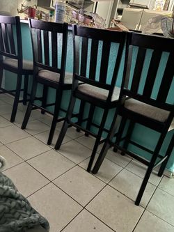 Four high chairs in good condition.