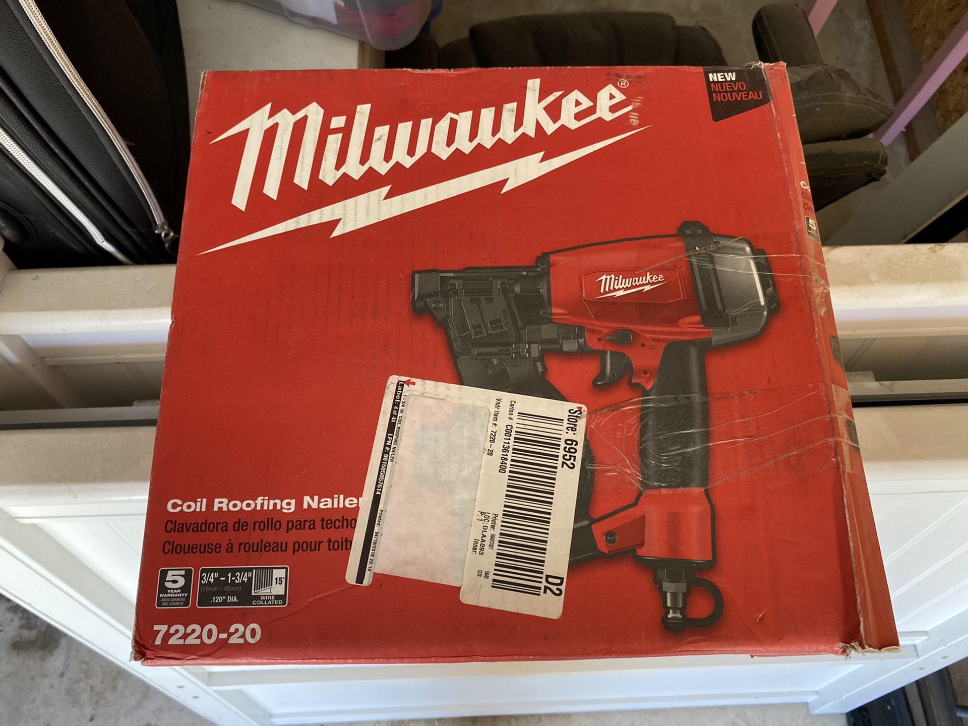 Milwaukee Roofing coil nail gun. Used only a hand full of times.