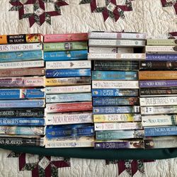Nora Roberts and Robyn Carr Novels, lot of 51.  Good condition.  44 popular Nora Roberts novels, 7 popular Robyn Carr novels.