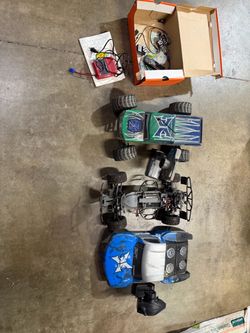 RC trucks with parts and charger