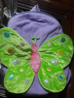Butterfly back pack$6, Shopkin bank$4